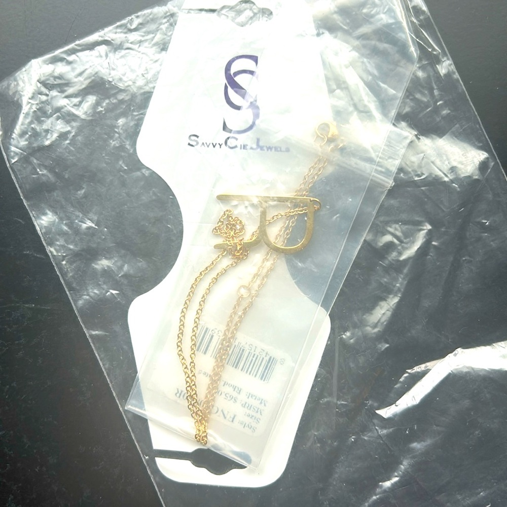 Capital letter “R” gold necklace